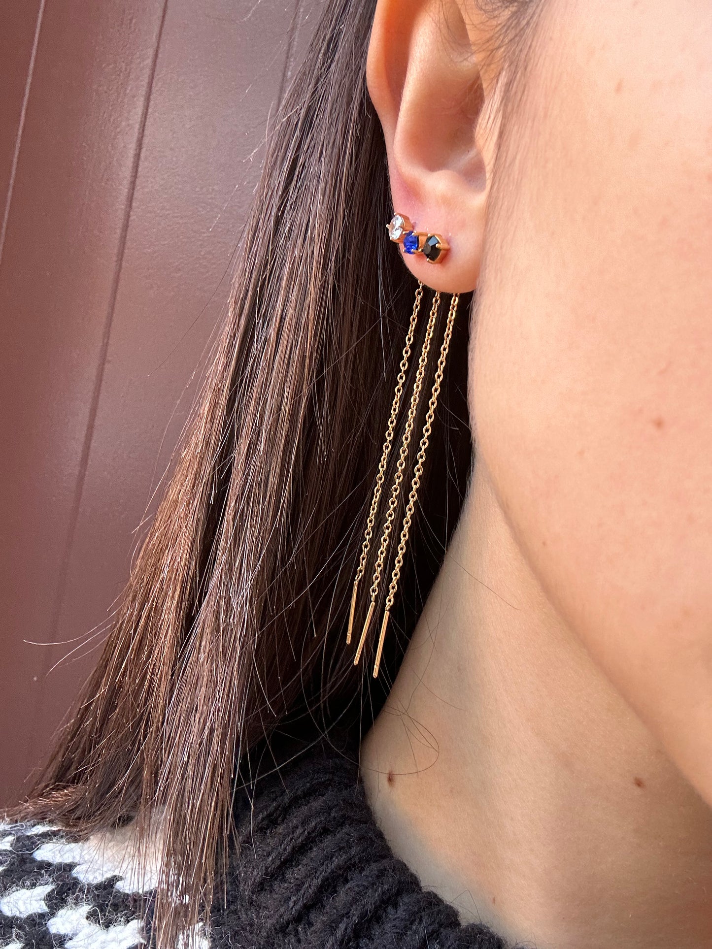 Mono-orecchini Niddle zircone