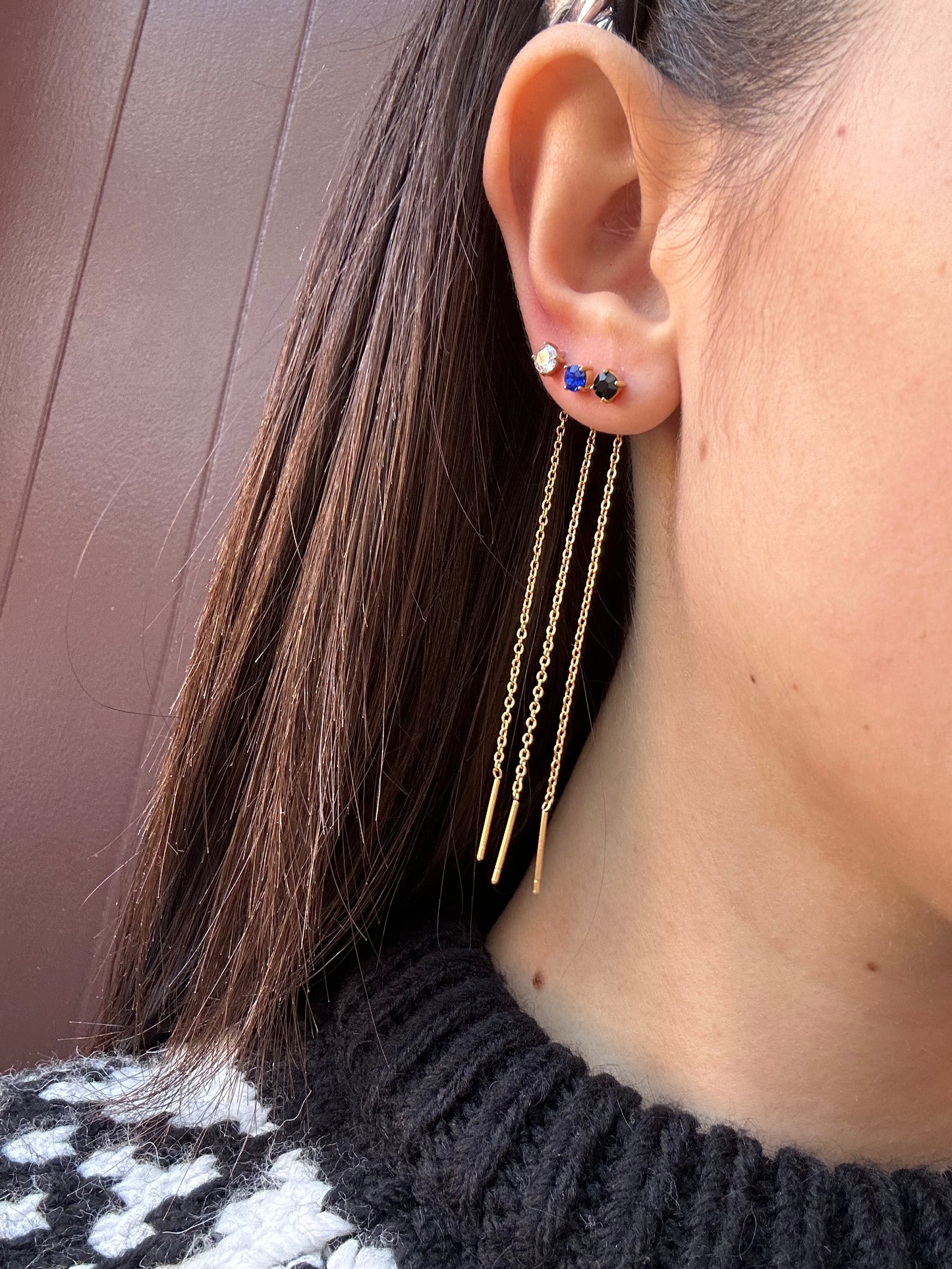 Mono-orecchini Niddle zircone
