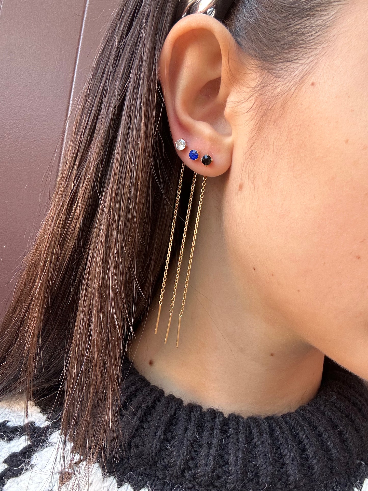 Mono-orecchini Niddle zircone