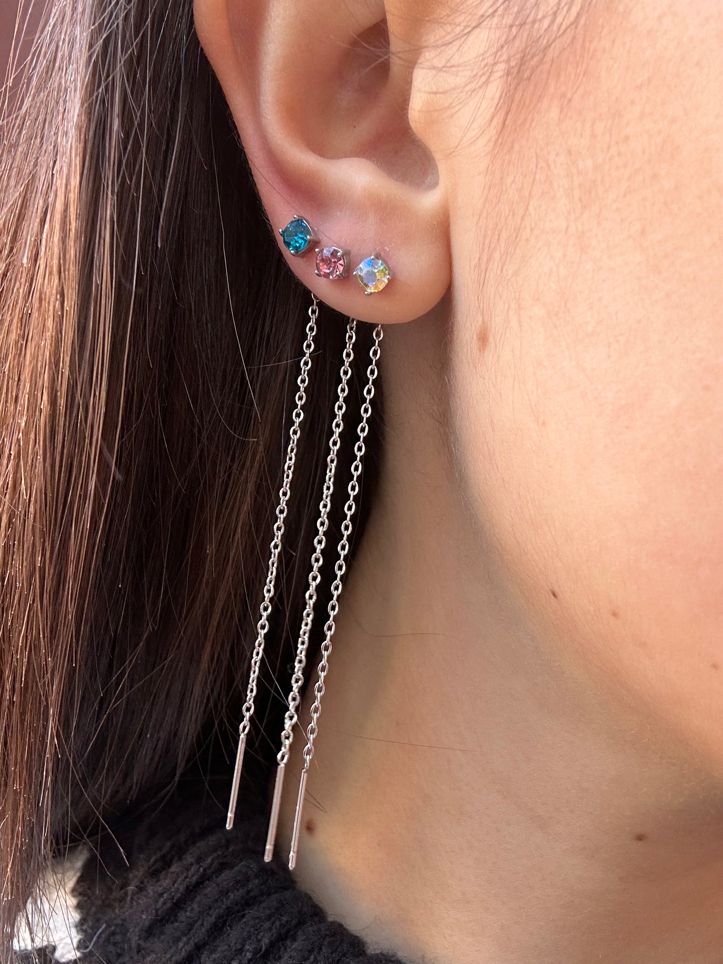 Mono-orecchini Niddle zircone