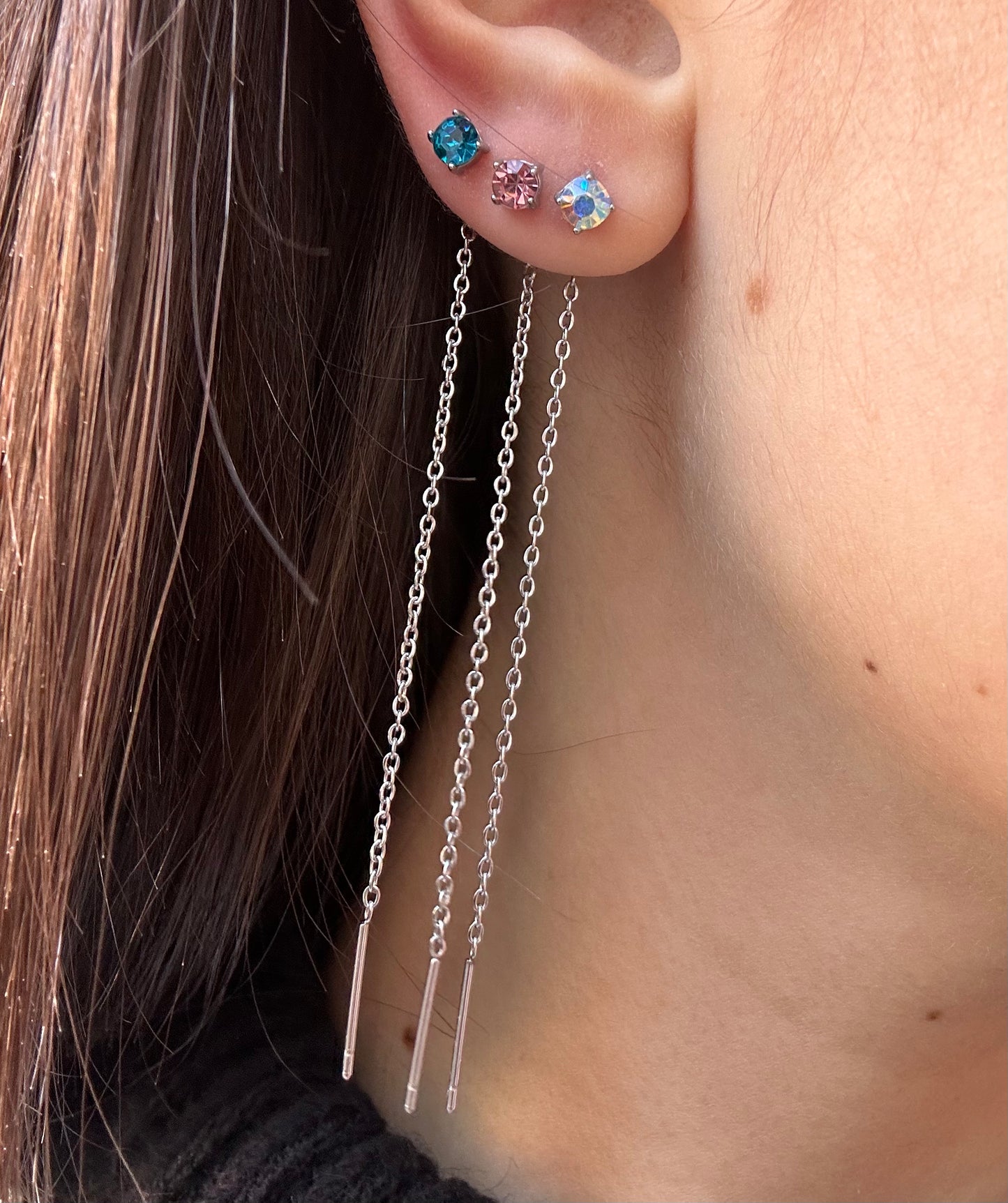 Mono-orecchini Niddle zircone