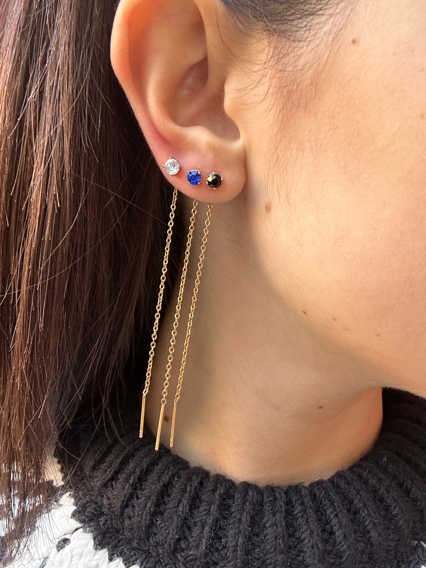 Mono-orecchini Niddle zircone