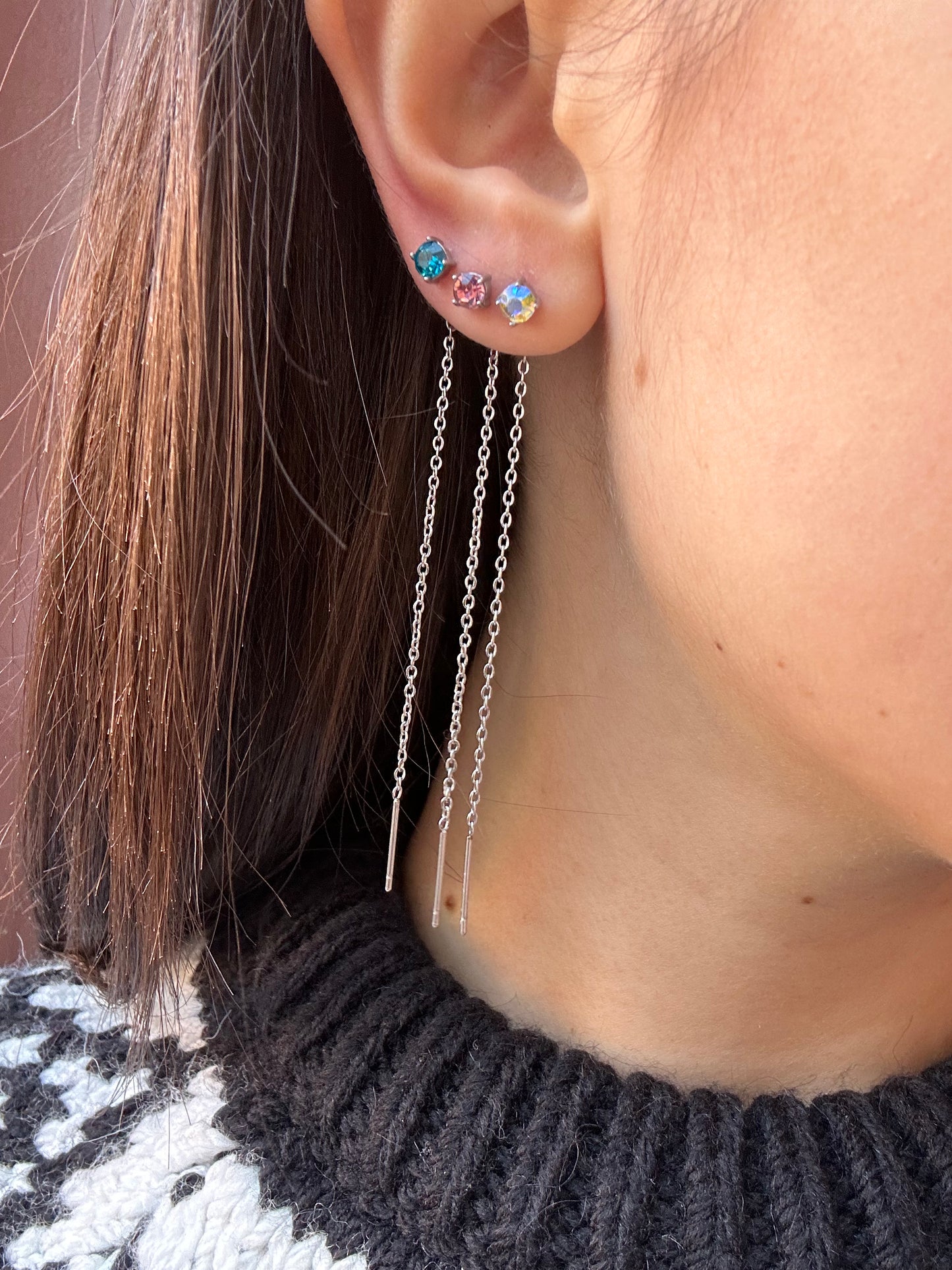 Mono-orecchini Niddle zircone