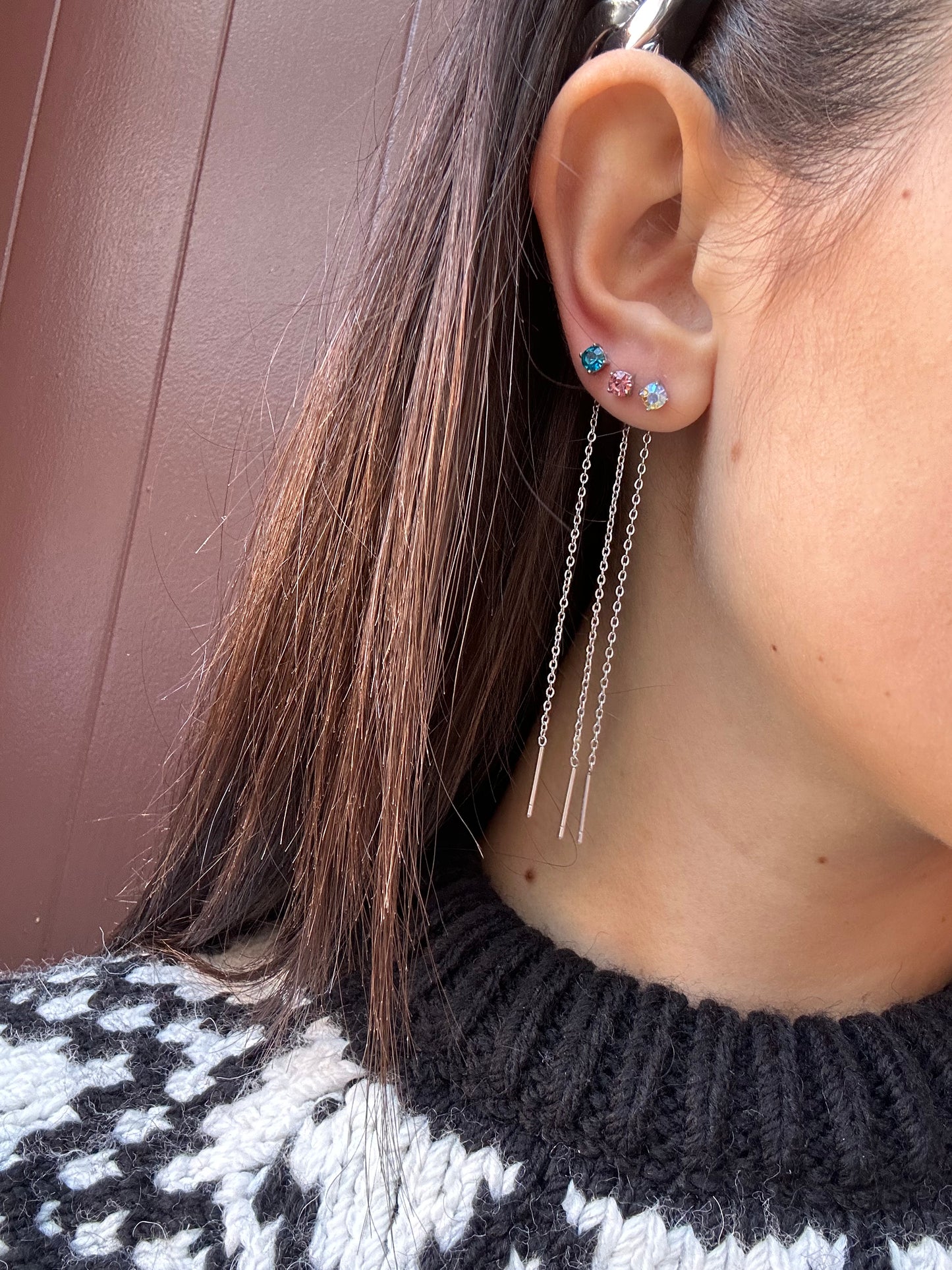 Mono-orecchini Niddle zircone