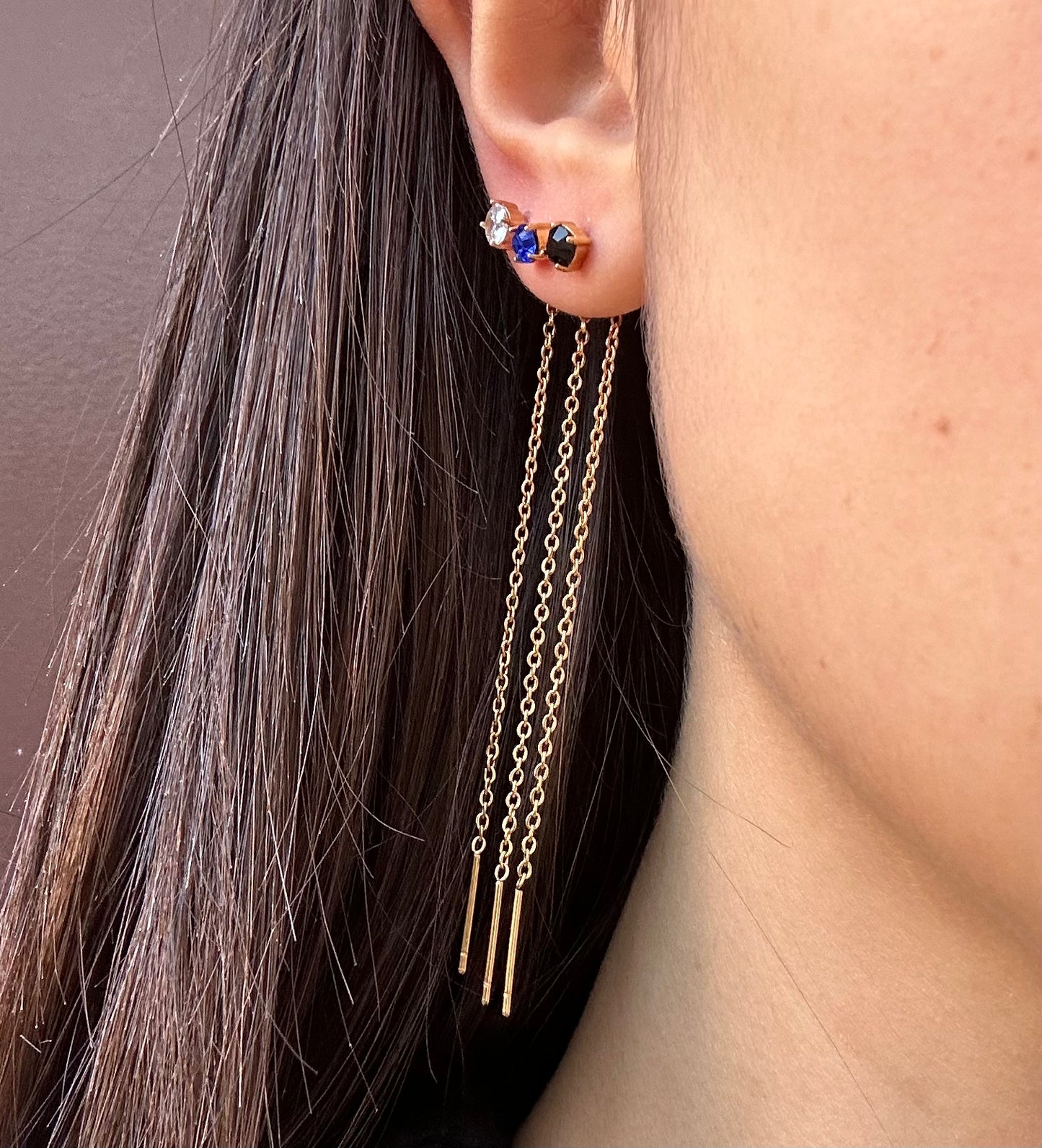 Mono-orecchini Niddle zircone