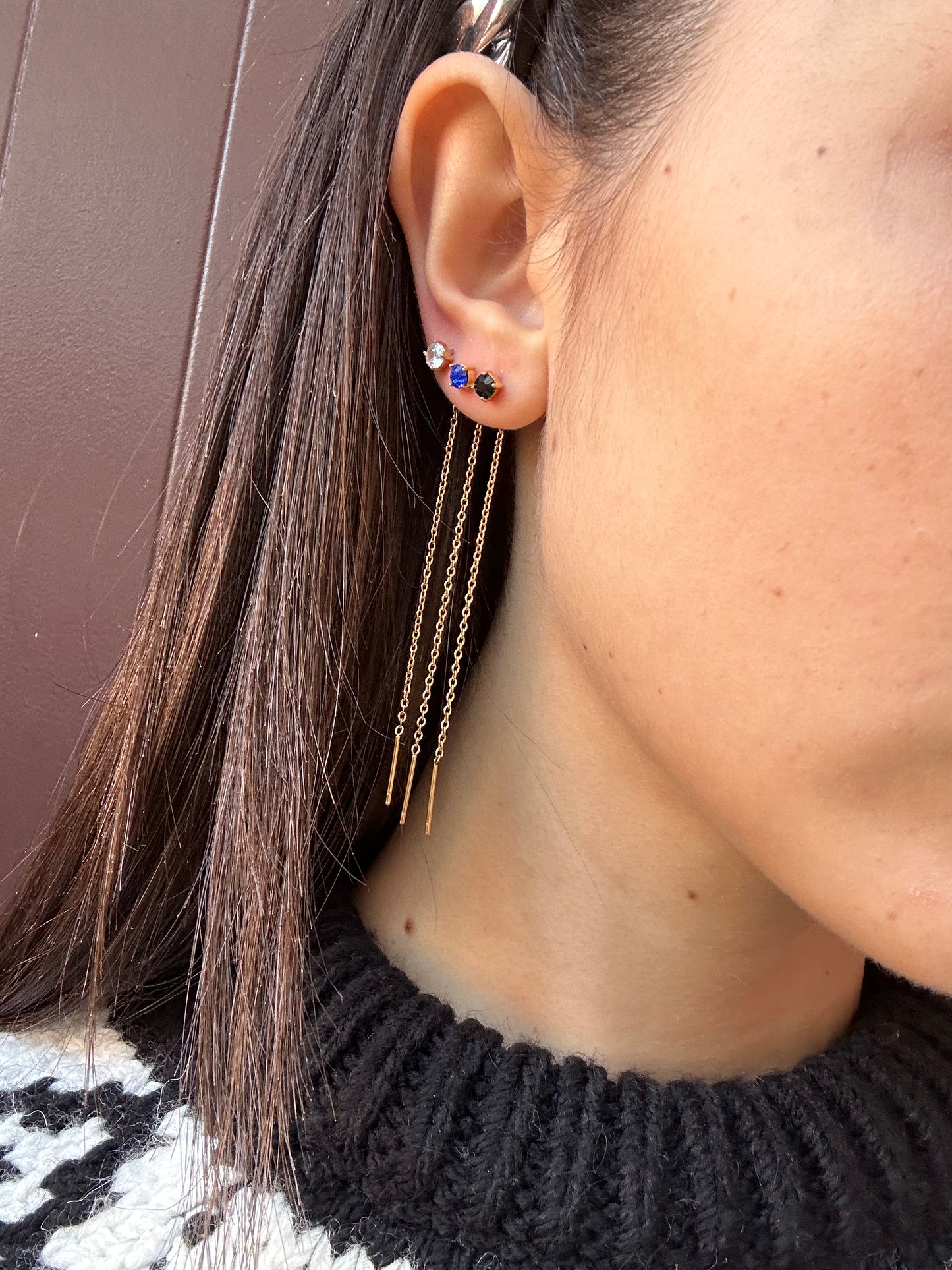 Mono-orecchini Niddle zircone