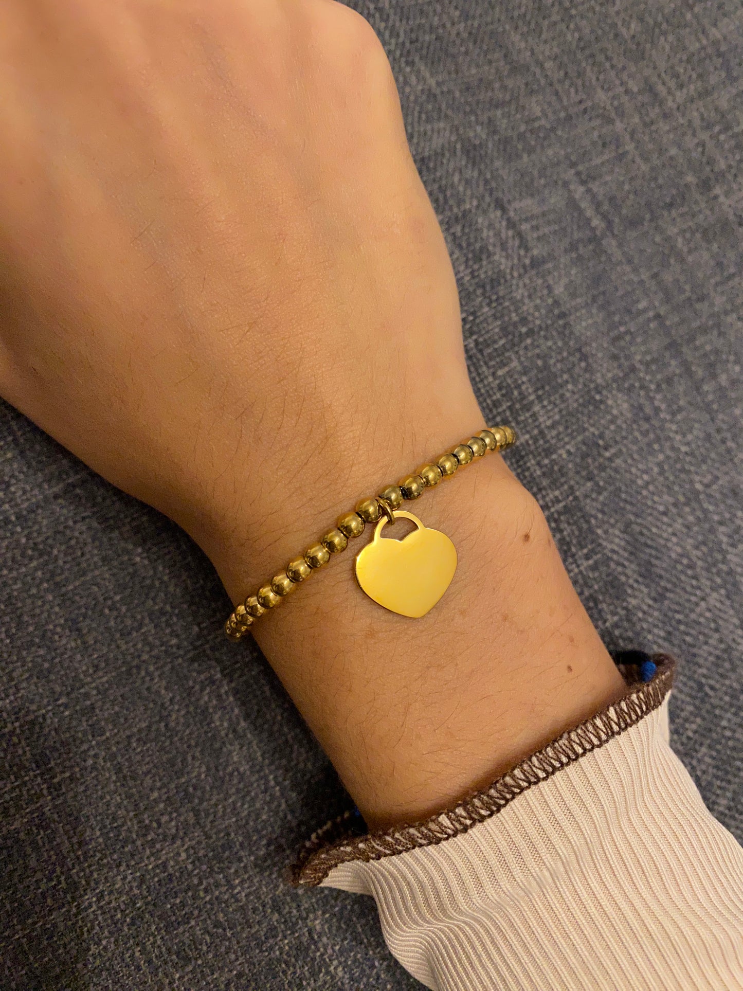 Bracciale a pallini con cuoricino