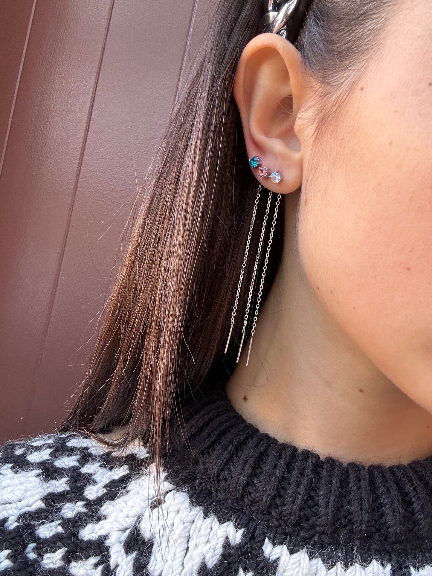 Mono-orecchini Niddle zircone