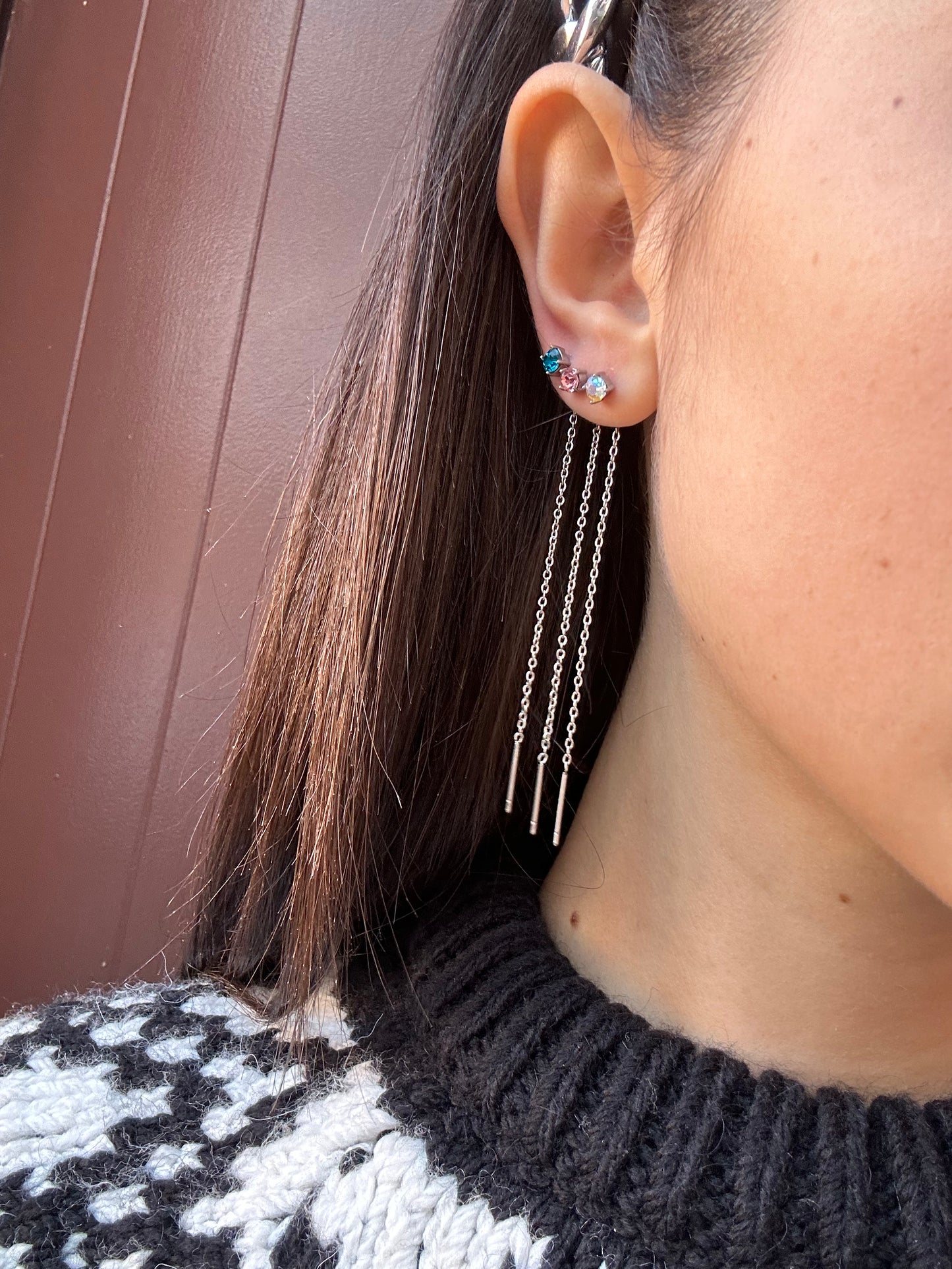 Mono-orecchini Niddle zircone