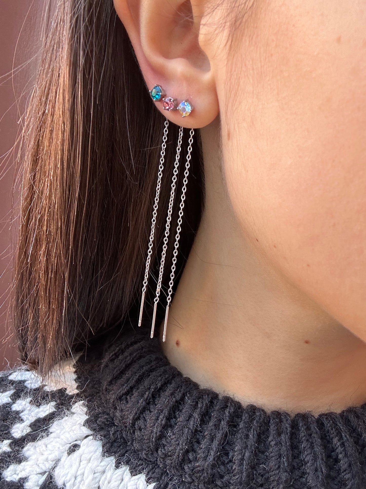 Mono-orecchini Niddle zircone