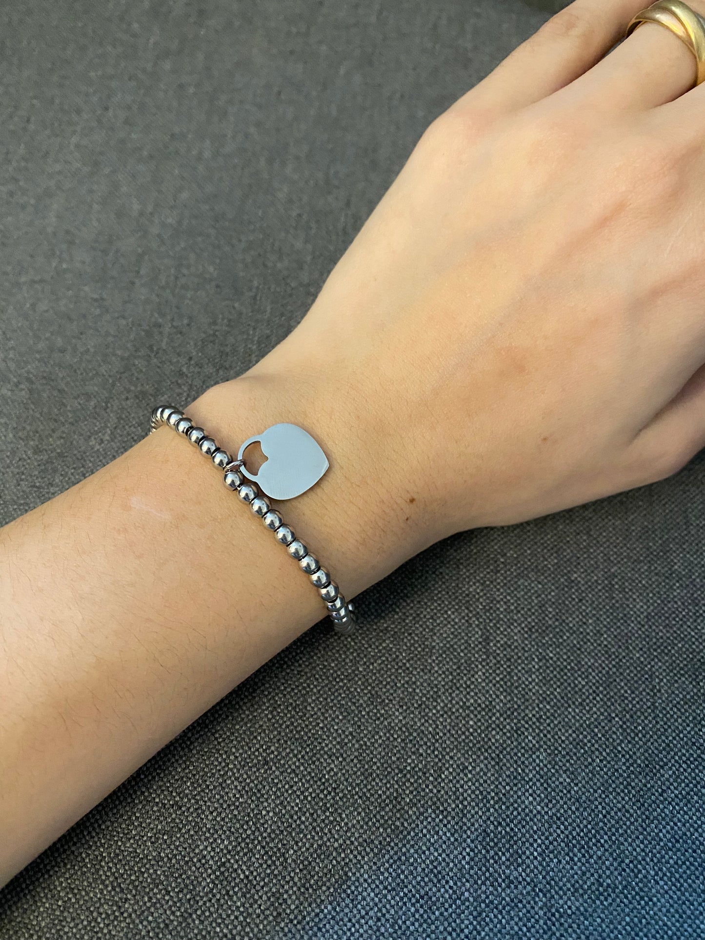 Bracciale a pallini con cuoricino