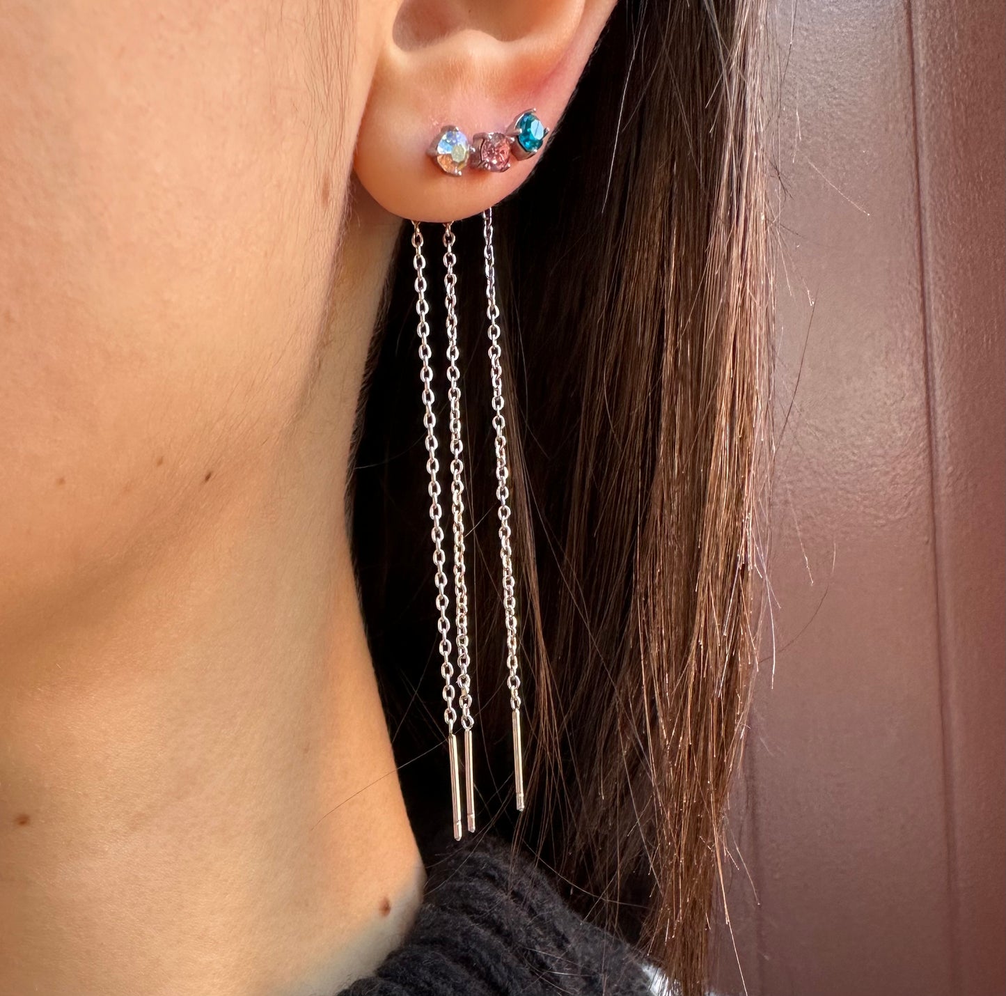 Mono-orecchini Niddle zircone