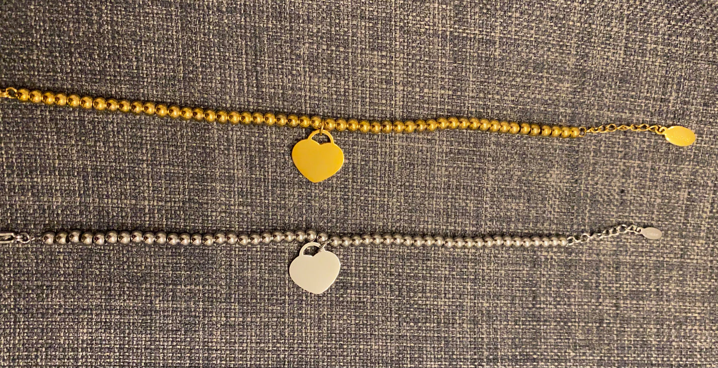 Bracciale a pallini con cuoricino