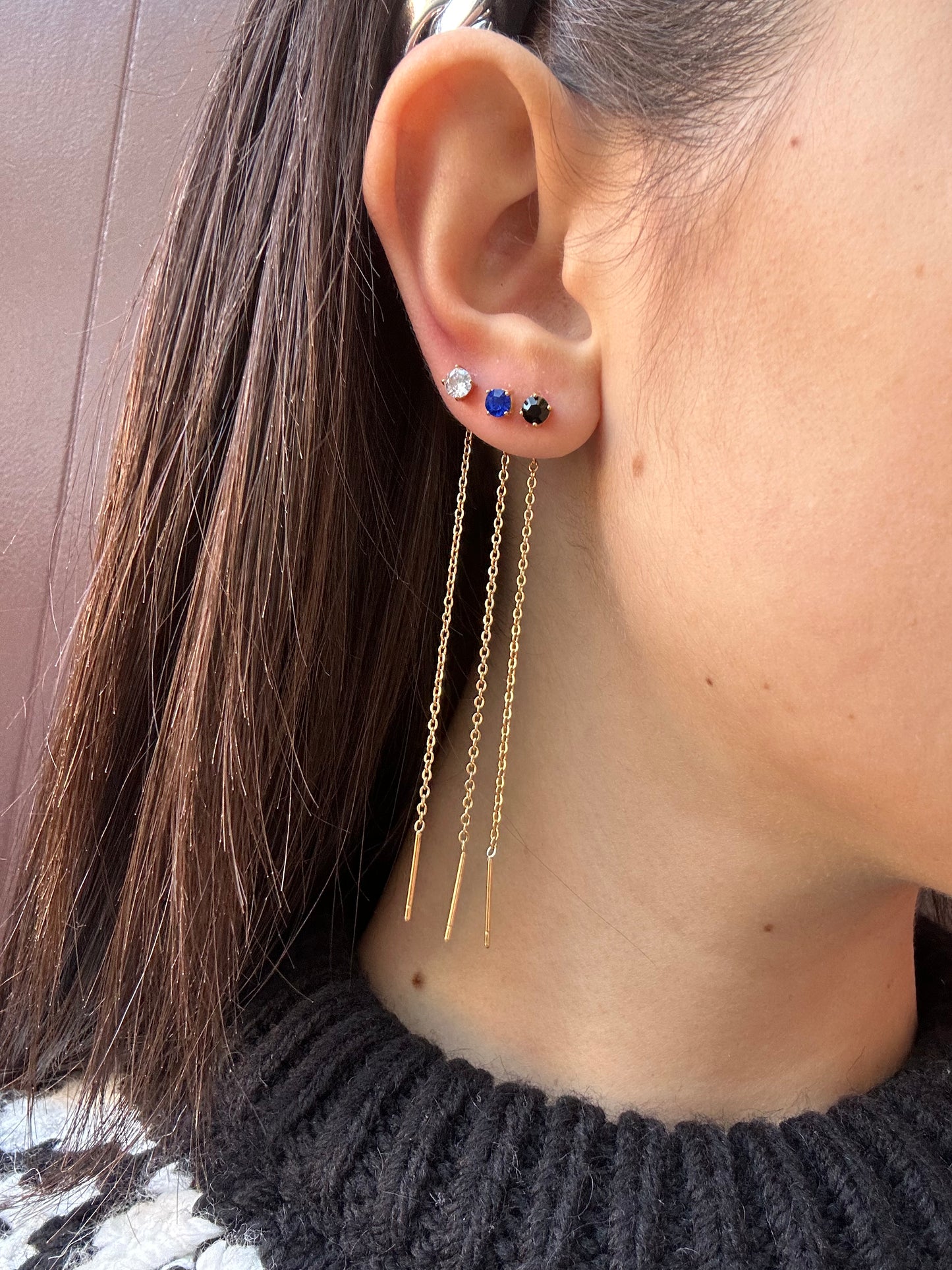 Mono-orecchini Niddle zircone