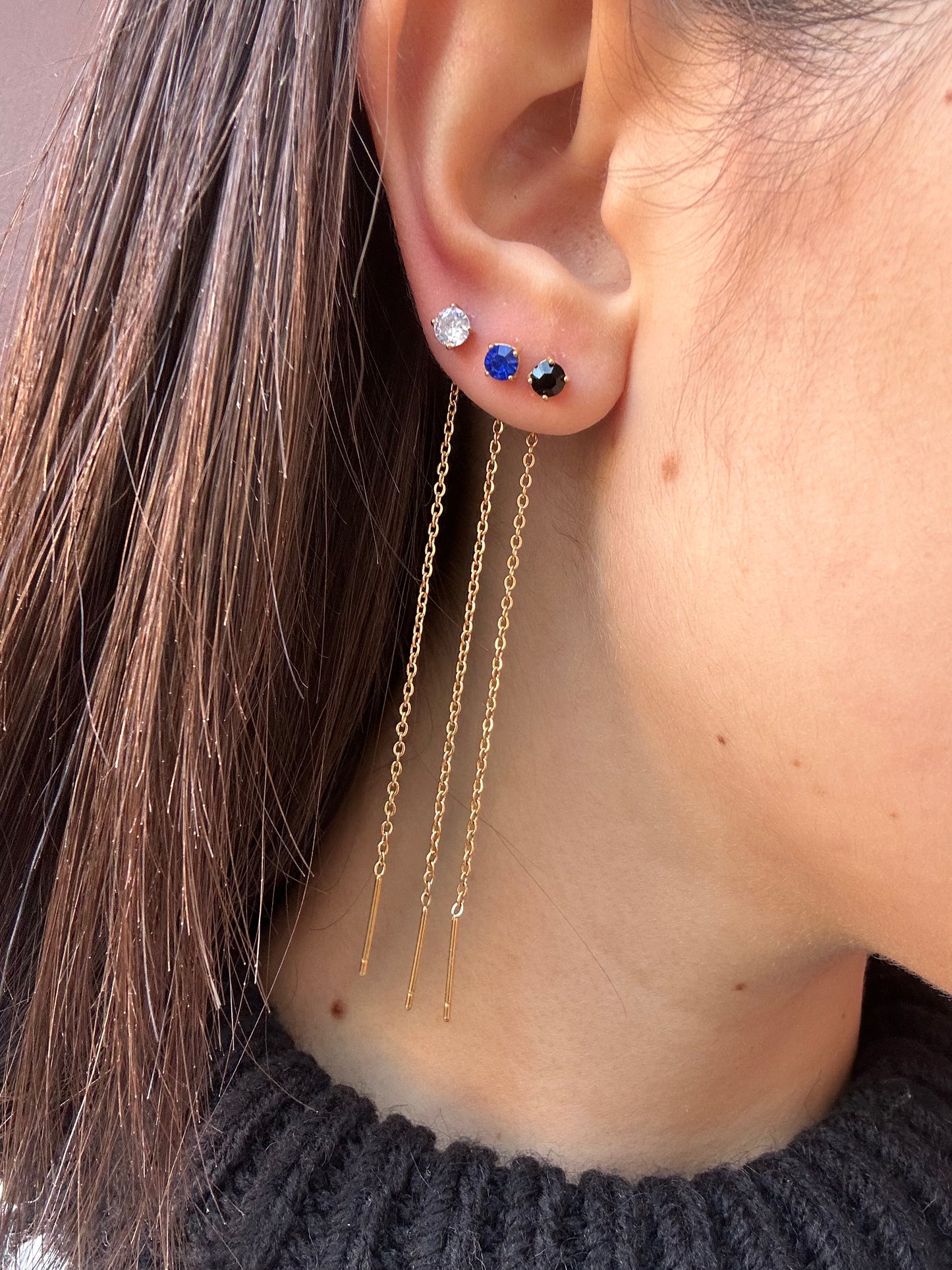 Mono-orecchini Niddle zircone