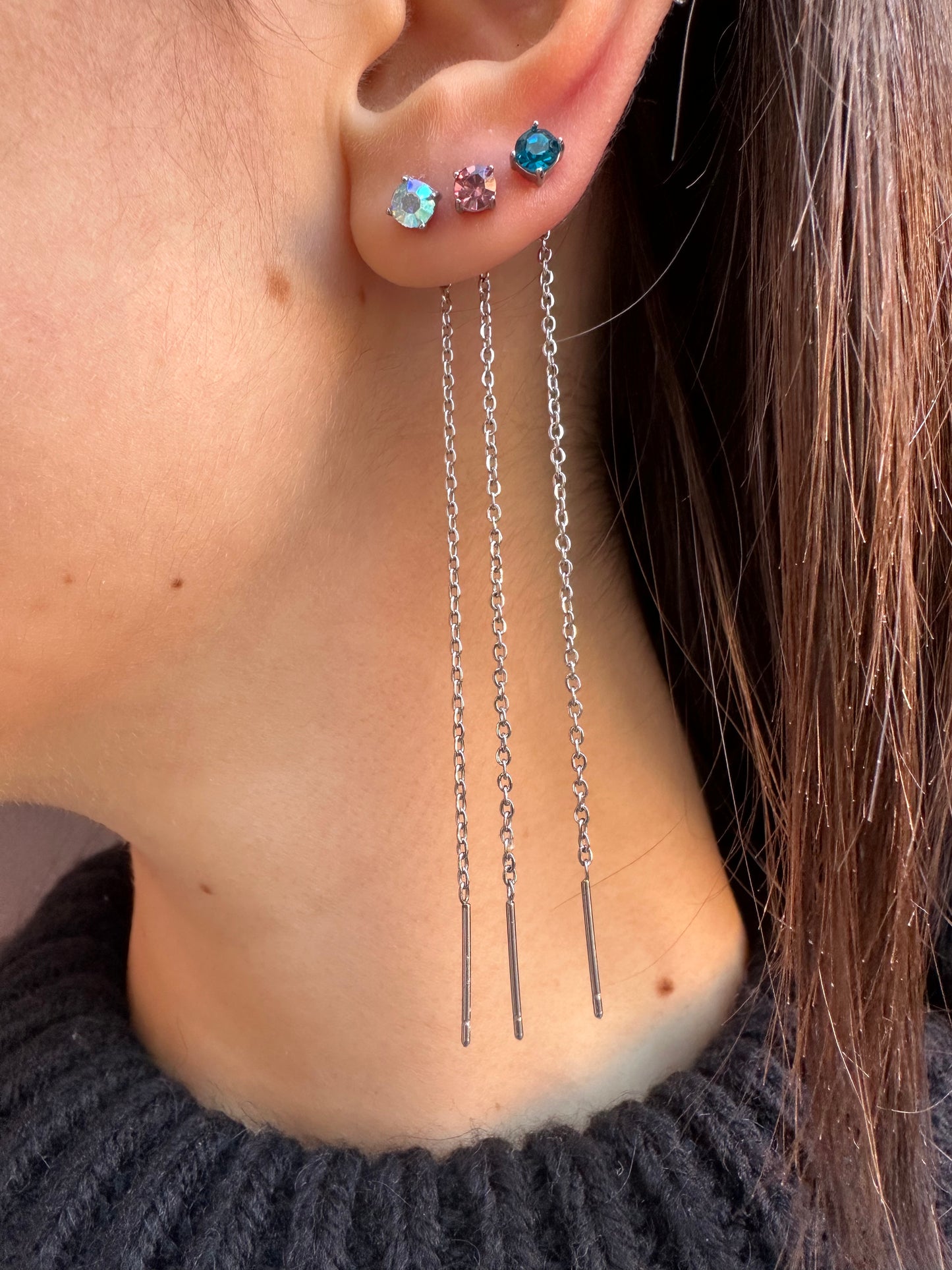 Mono-orecchini Niddle zircone
