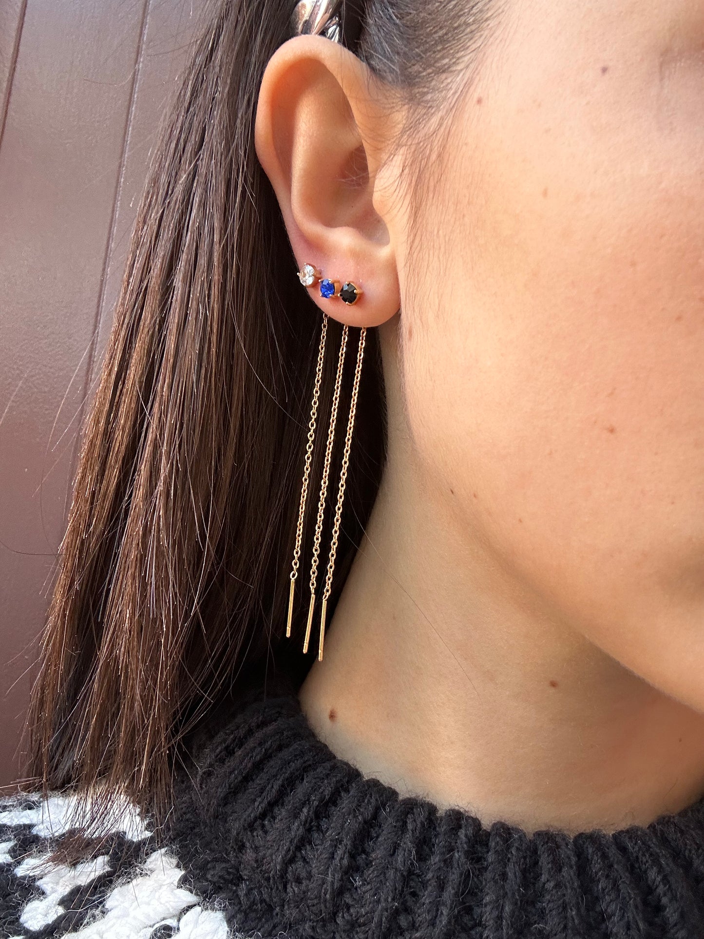 Mono-orecchini Niddle zircone