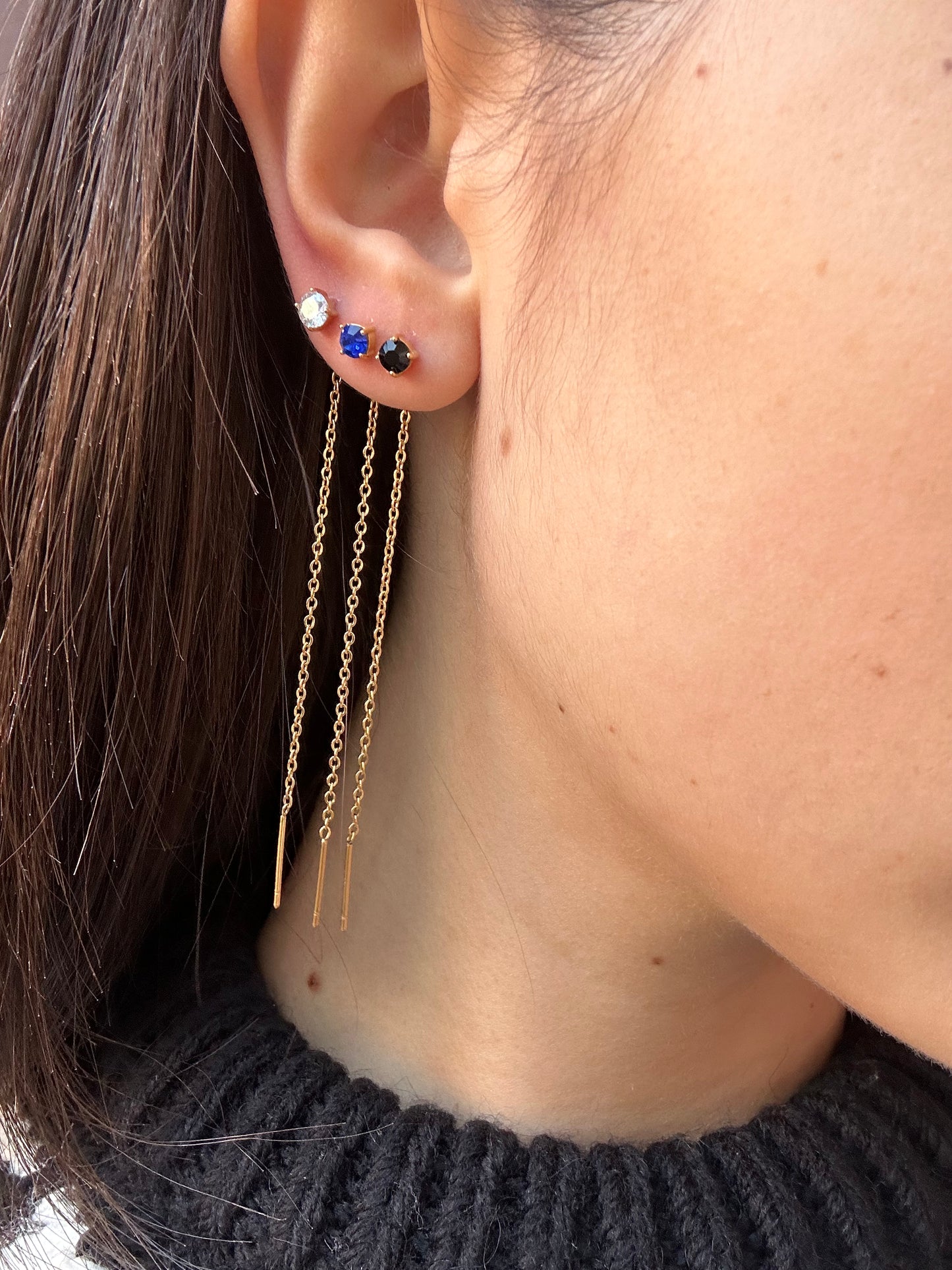 Mono-orecchini Niddle zircone