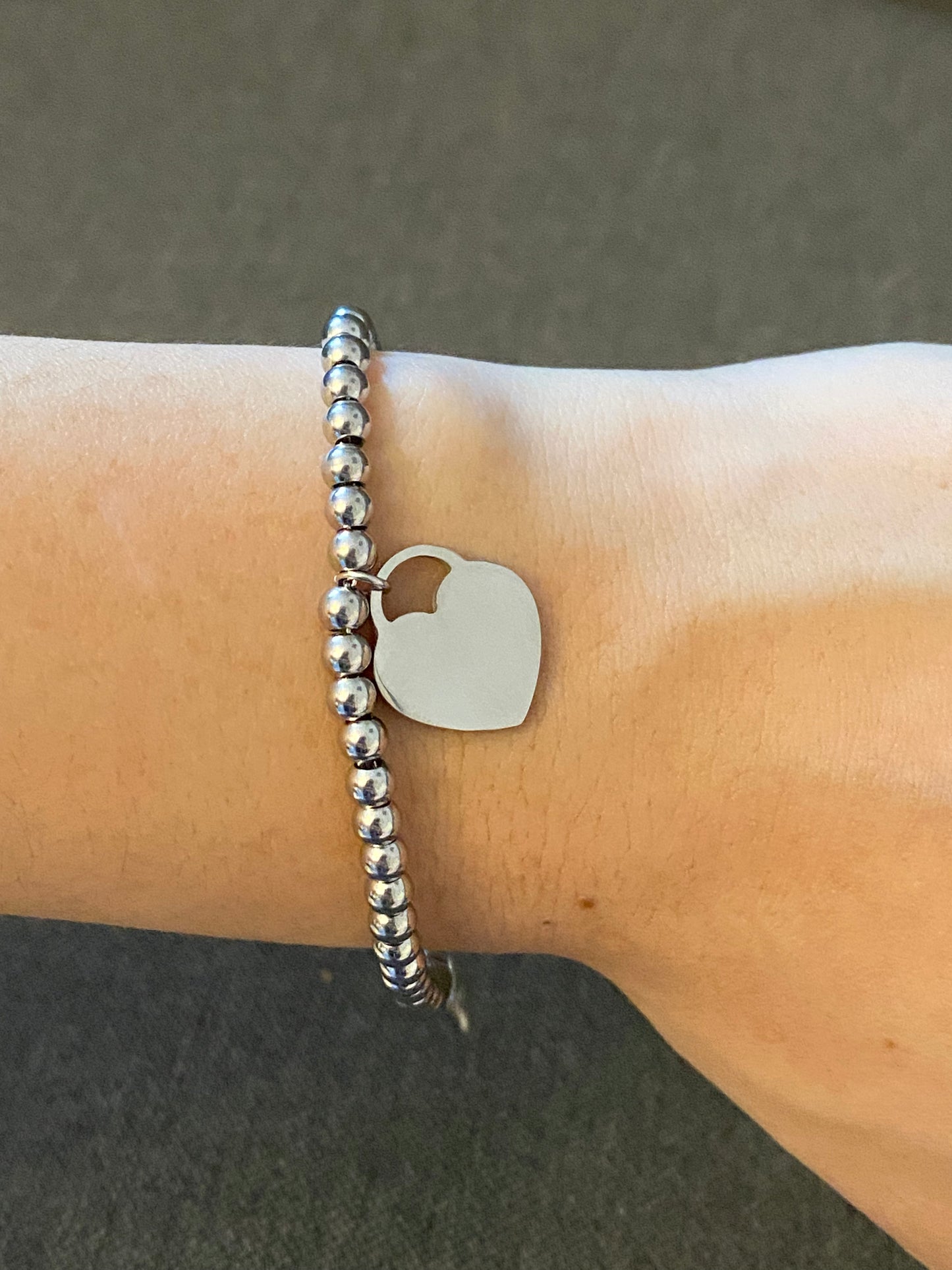Bracciale a pallini con cuoricino