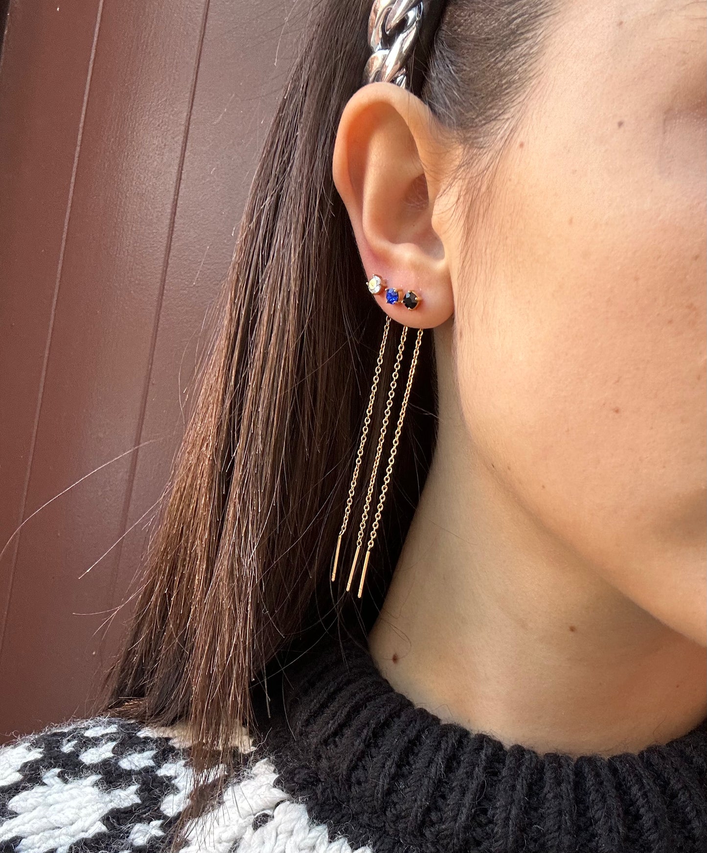 Mono-orecchini Niddle zircone