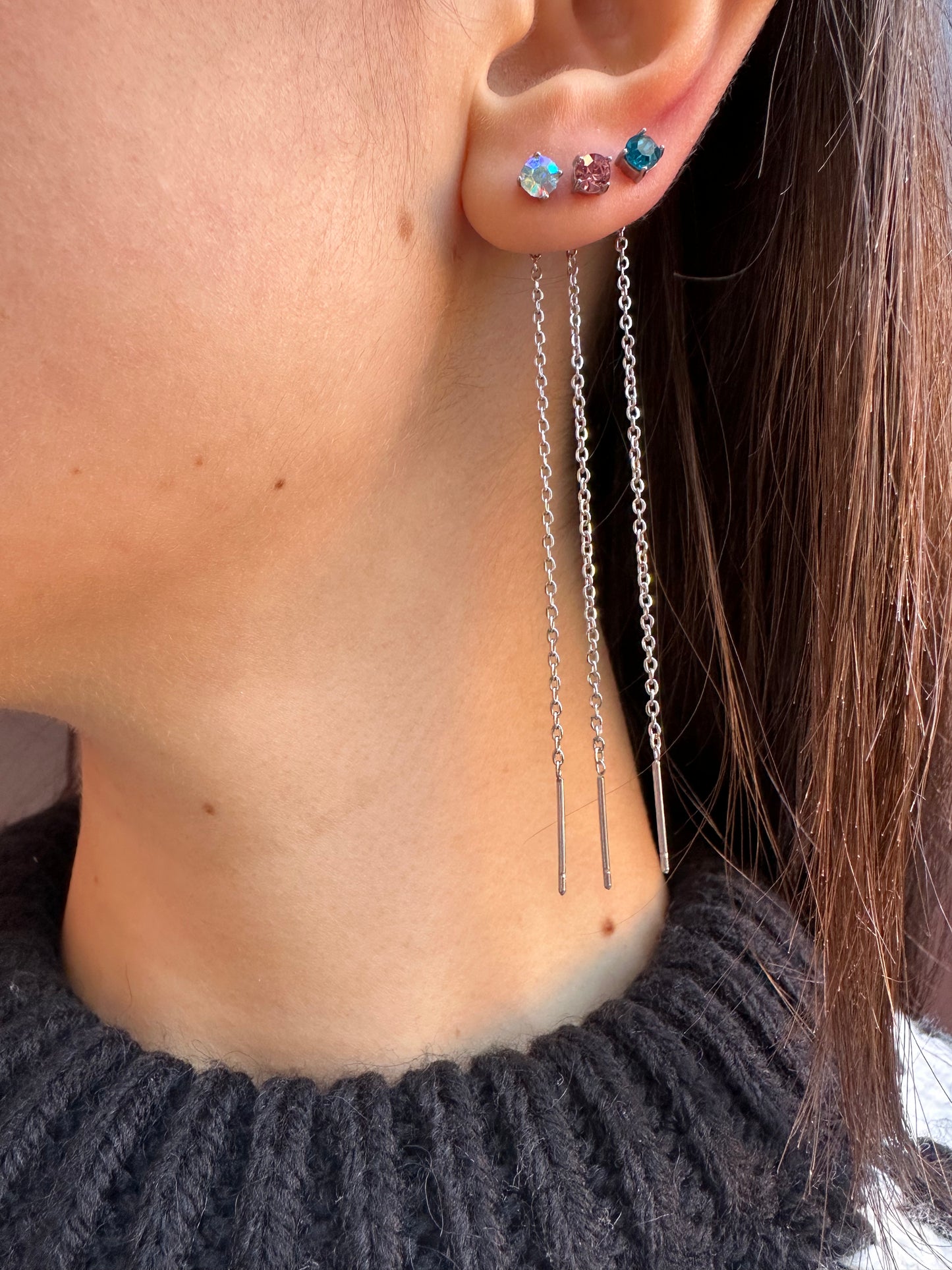 Mono-orecchini Niddle zircone