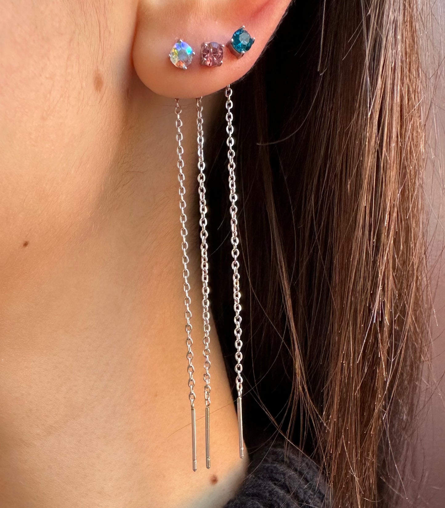 Mono-orecchini Niddle zircone