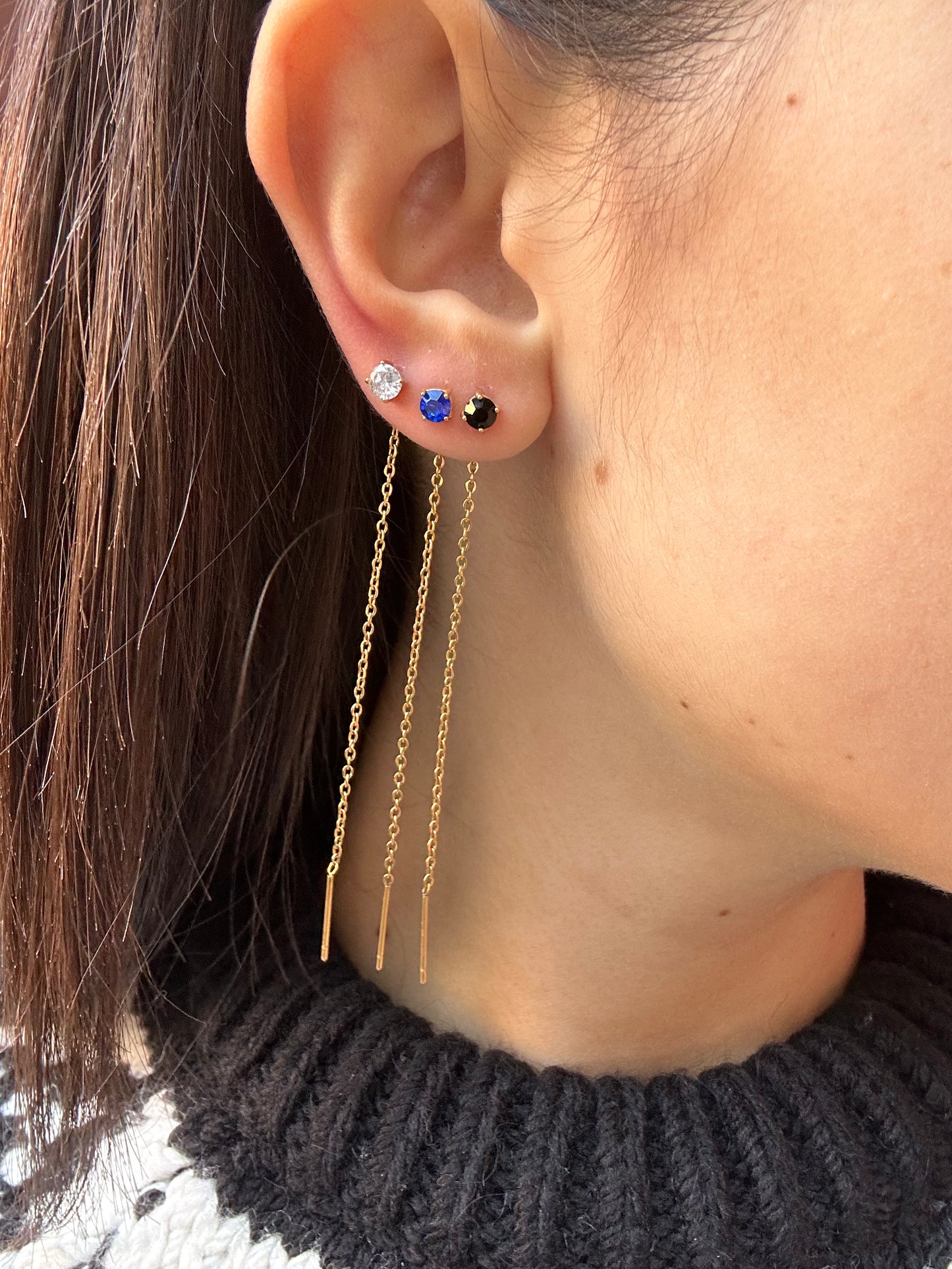 Mono-orecchini Niddle zircone