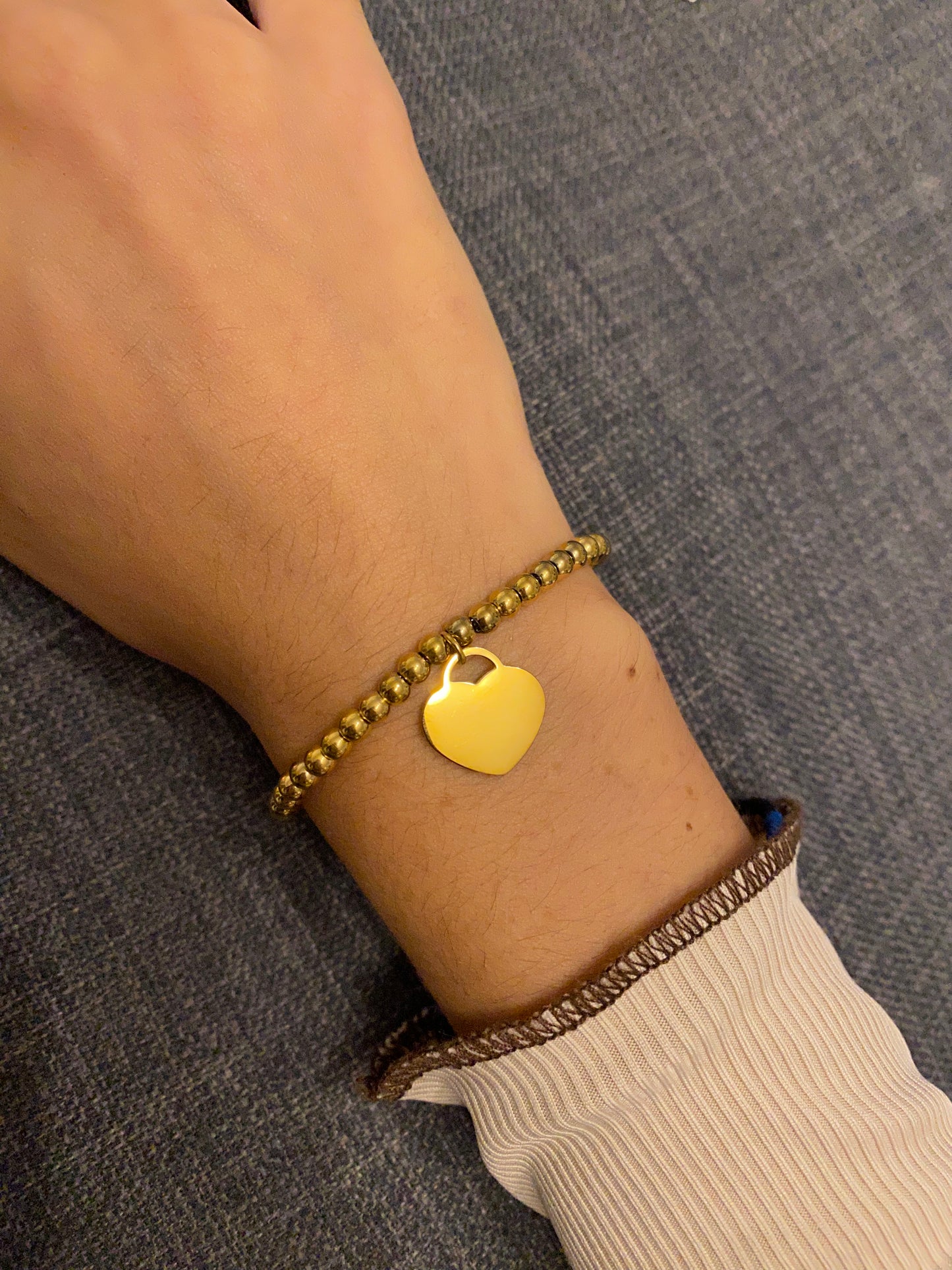 Bracciale a pallini con cuoricino