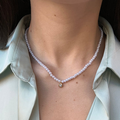 Collana di perle con punto luce