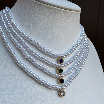 Collana di perle con punto luce