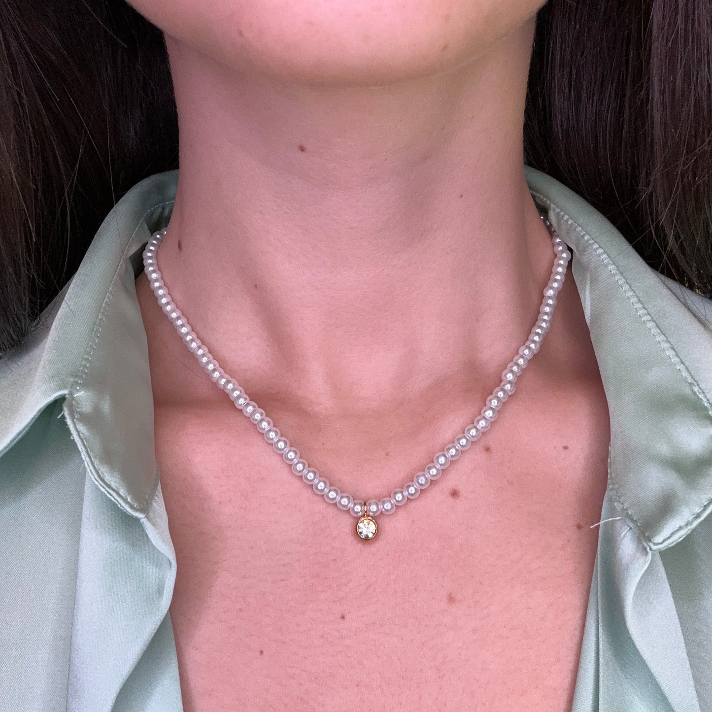 Collana di perle con punto luce