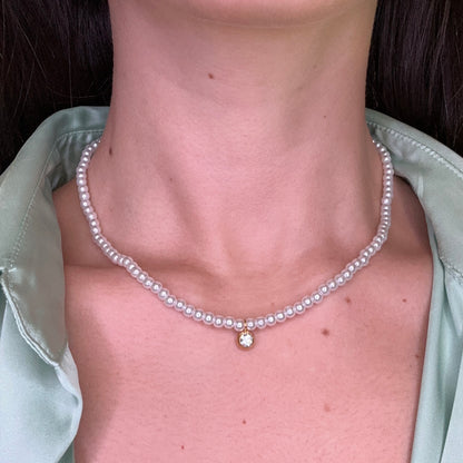 Collana di perle con punto luce