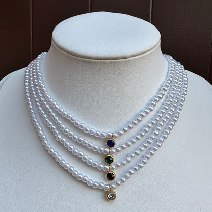 Collana di perle con punto luce